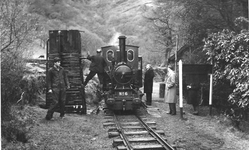 On my 1st visit to the TR. At Dolgoch taking water Driver Herbert Jones & me firing and Boiler inspector on platform - April 1958