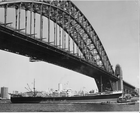 SS Paproa passing under Sydney Harbour Bridge 1960