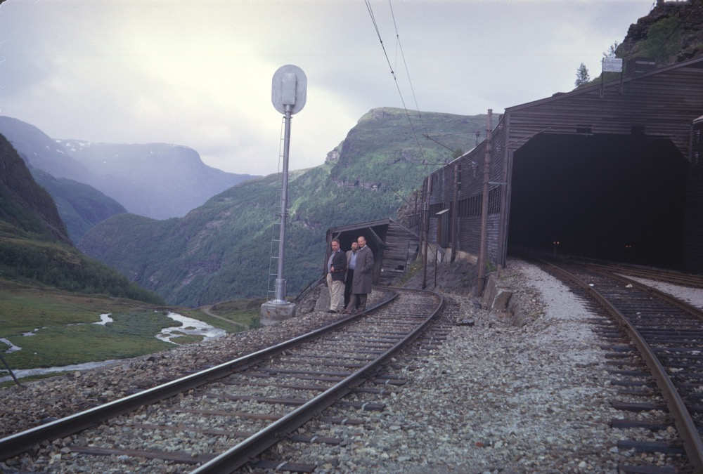 One of the snowsheds. Bob Symes and John Slater with our hosts looking down the valley.